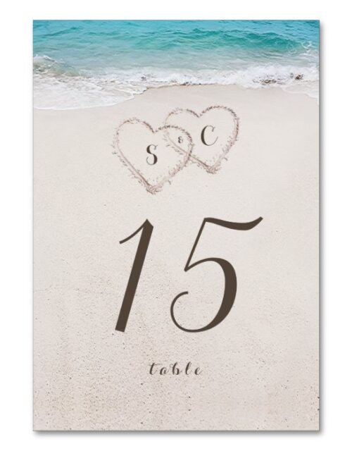 Hearts in the sand destination beach wedding table number