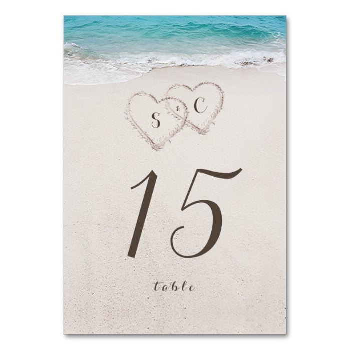 Hearts in the sand destination beach wedding table number
