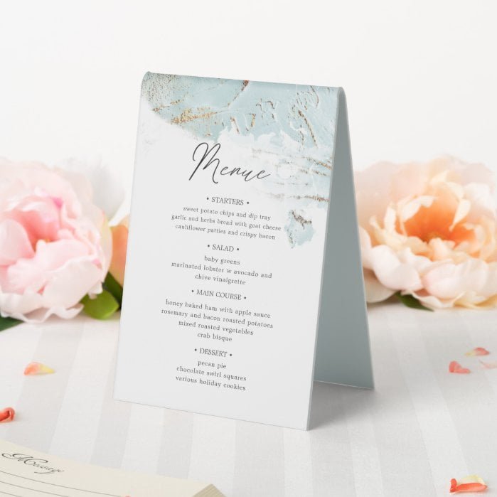 textured blue gold table number and wedding menu table tent sign