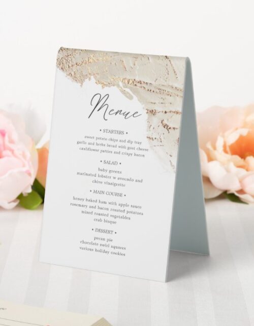 textured gold table number and wedding menu table tent sign